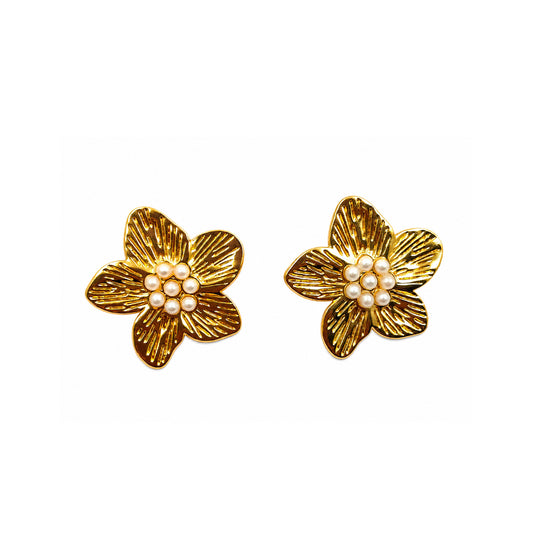 Gold pearl flower stud earrings pair on white background