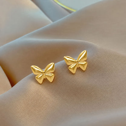 Gold plated butterfly stud earrings with sculpted wings