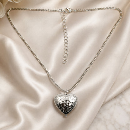 Silver heart necklace styled as romantic fashion jewellery for women