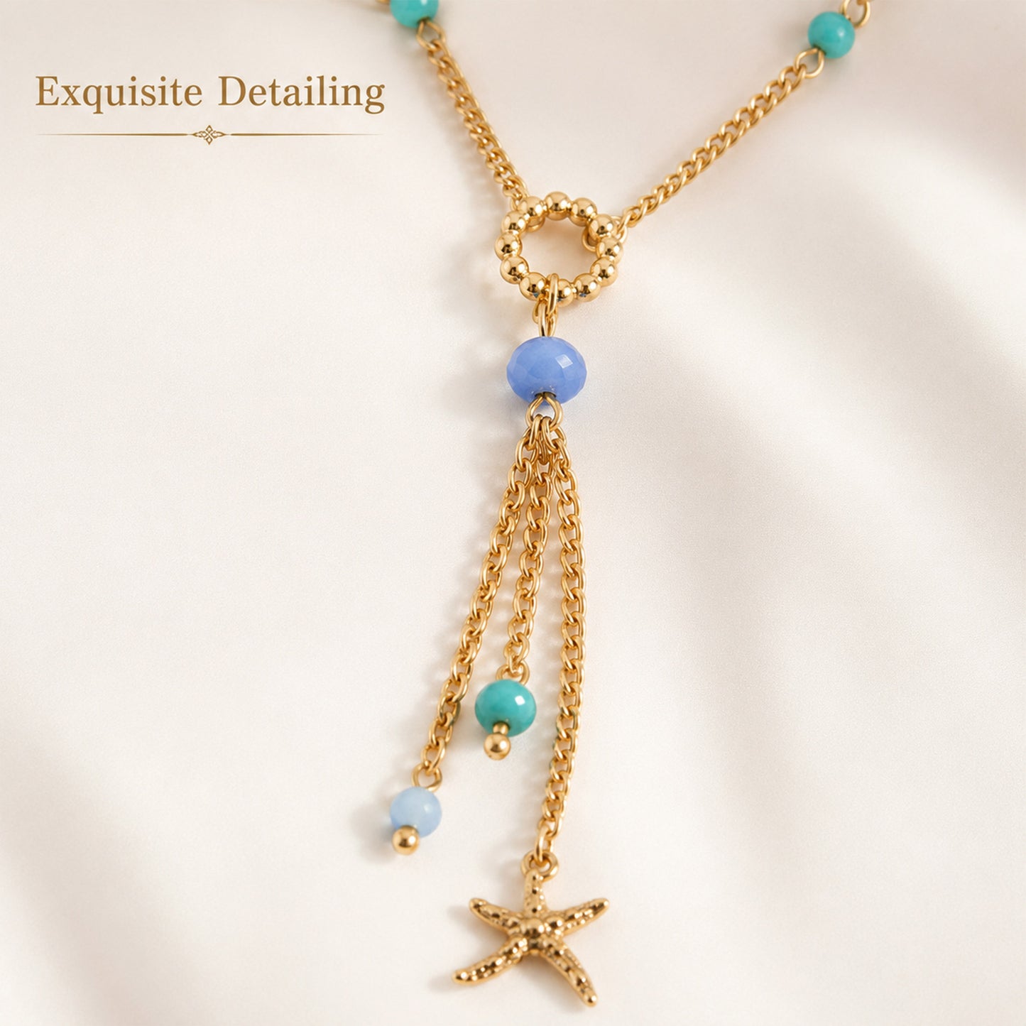 Gold plated starfish pendant necklace with blue bead accents