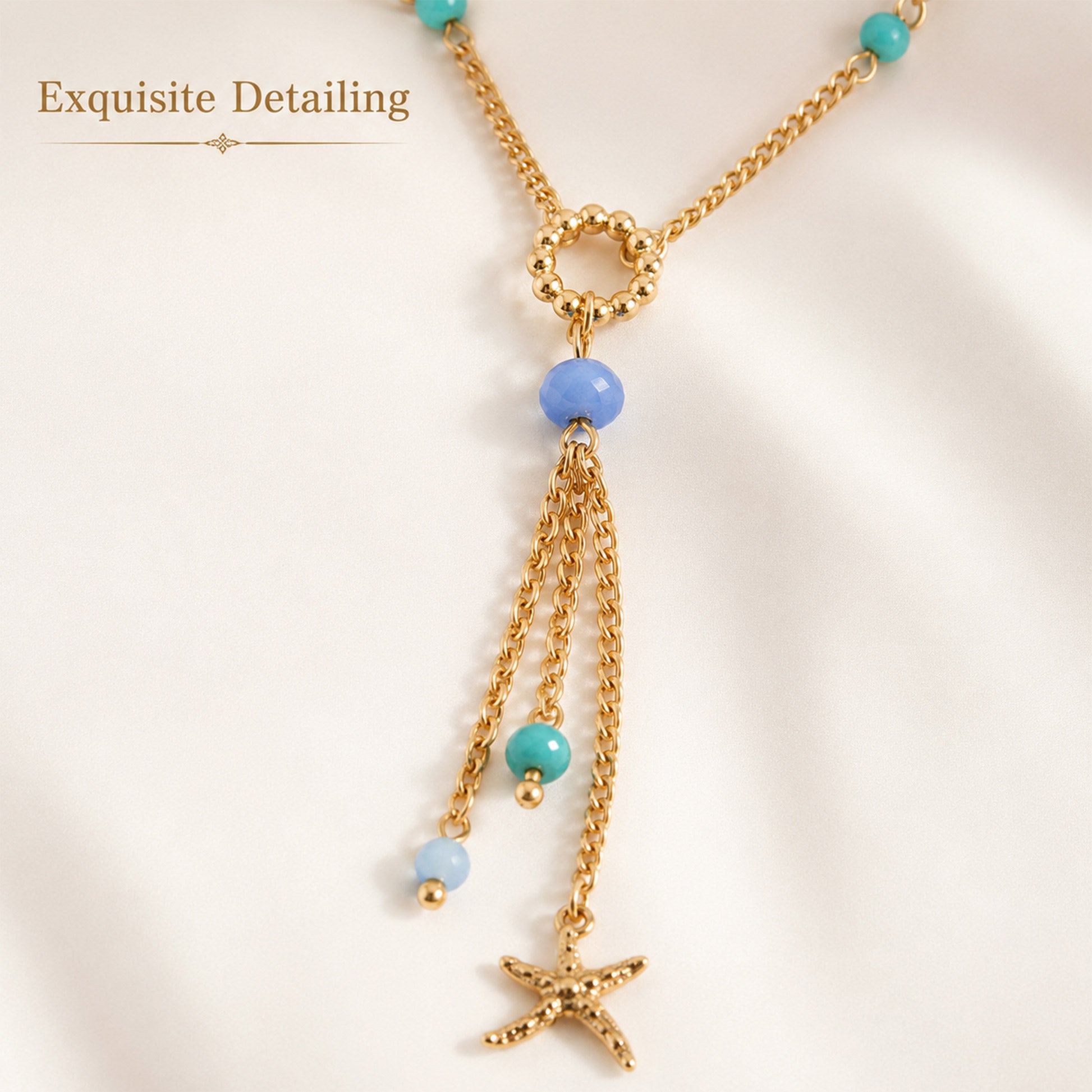 Gold plated starfish pendant necklace with blue bead accents