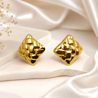 Gold plated textured stud earrings with polished finish
