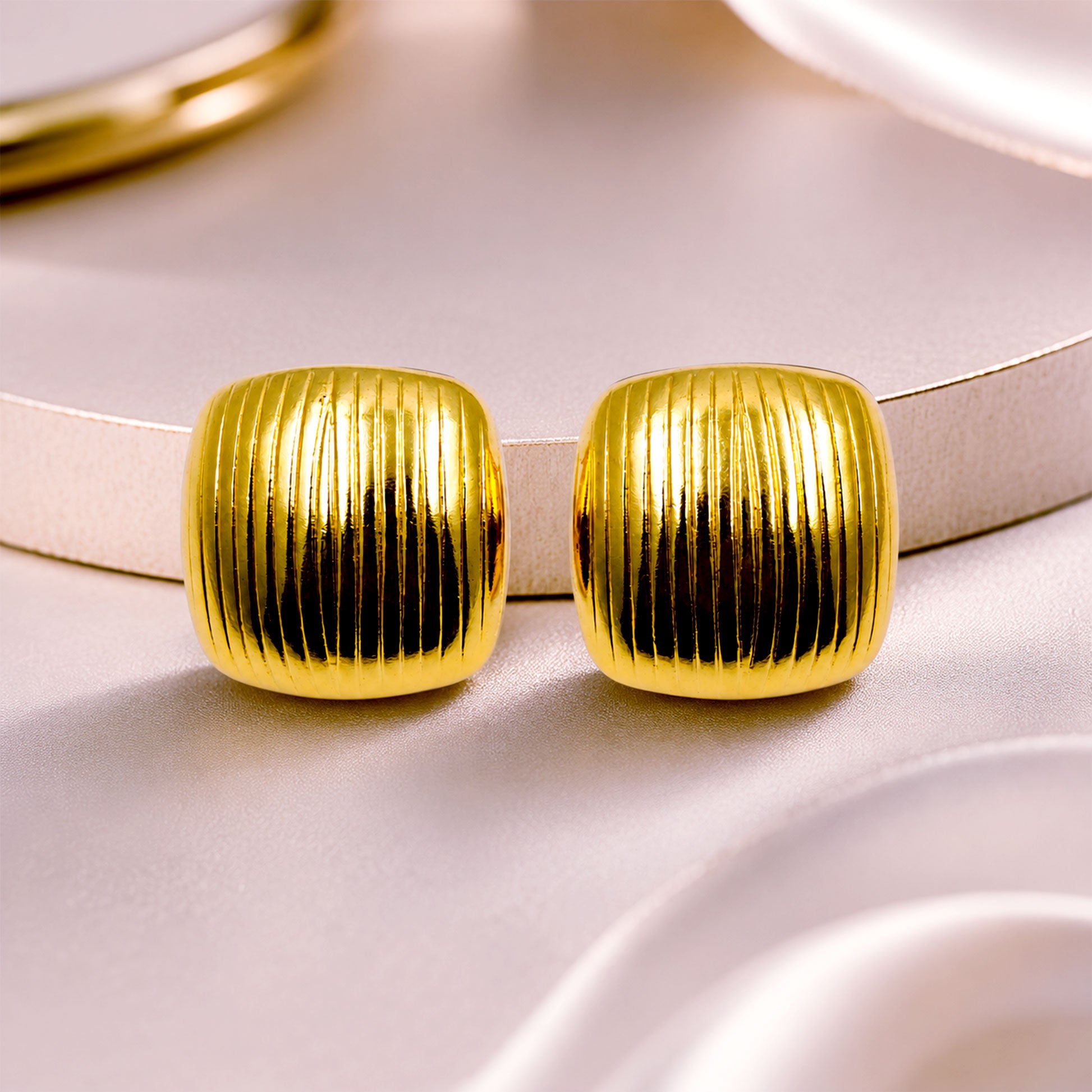 Lightweight gold plated ribbed stud earrings for gifting and casual wear