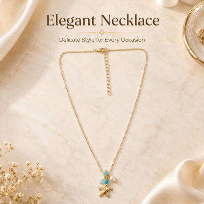 Gold plated ocean-inspired pendant necklace with colourful charms