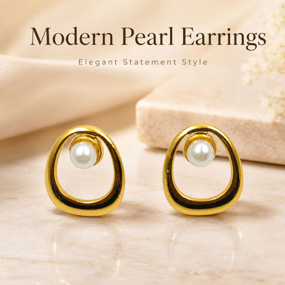 Detailed view of modern open oval gold stud earrings