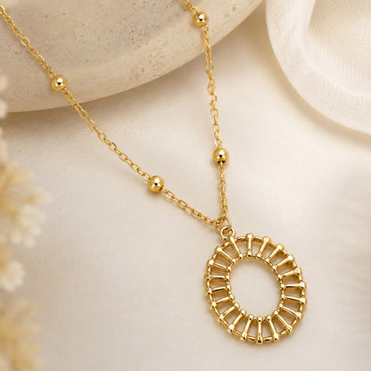 Gold plated necklace with polished bead-accented chain