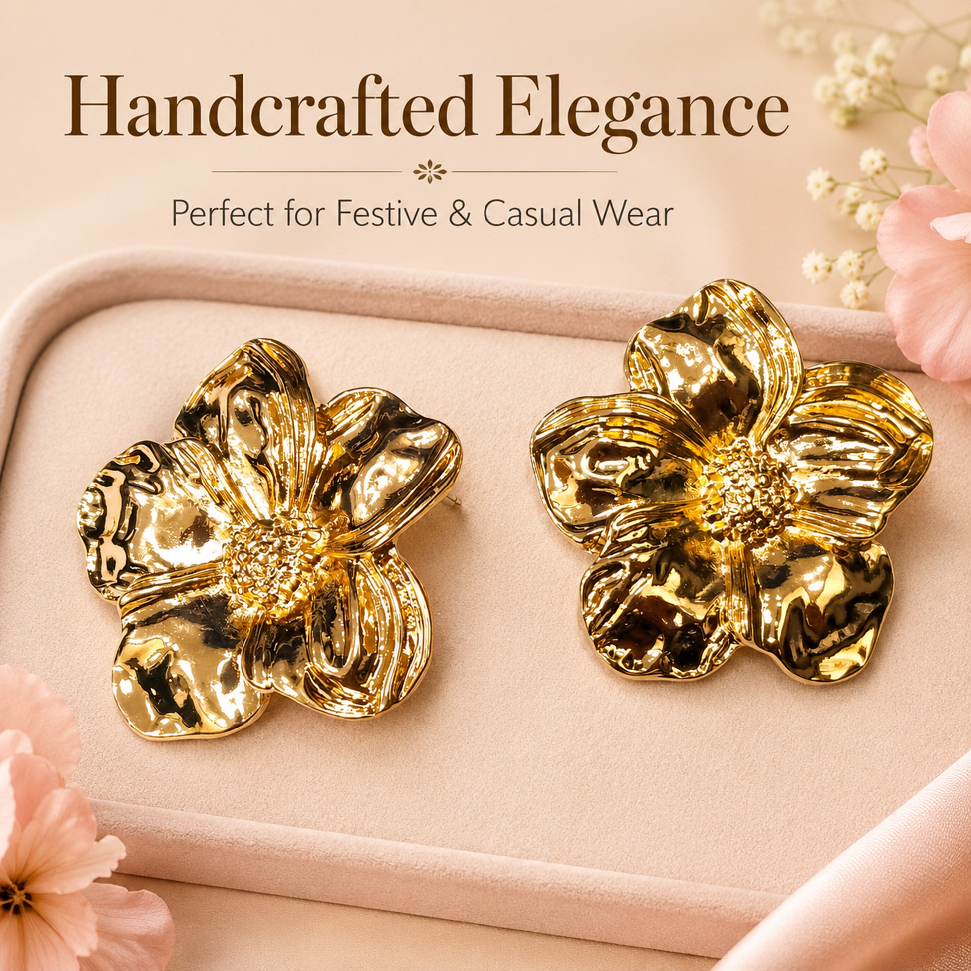 Detailed view of large sculpted gold floral stud earrings