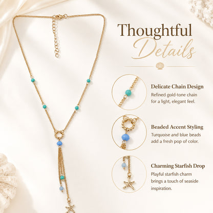 Detailed view of multi-chain tassel and starfish charm necklace