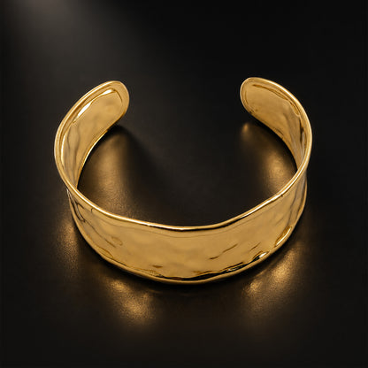 Gold open cuff bracelet styled as elegant fashion jewellery