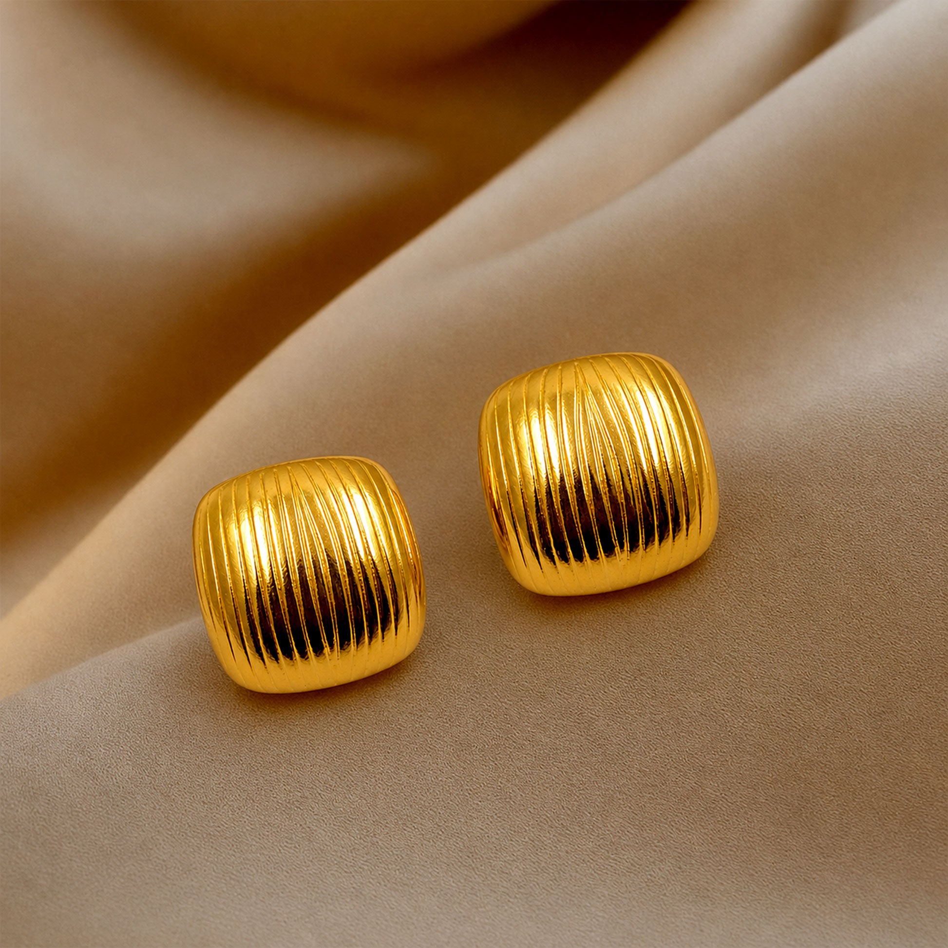 Stylish gold ribbed earrings for women daily wear and party look
