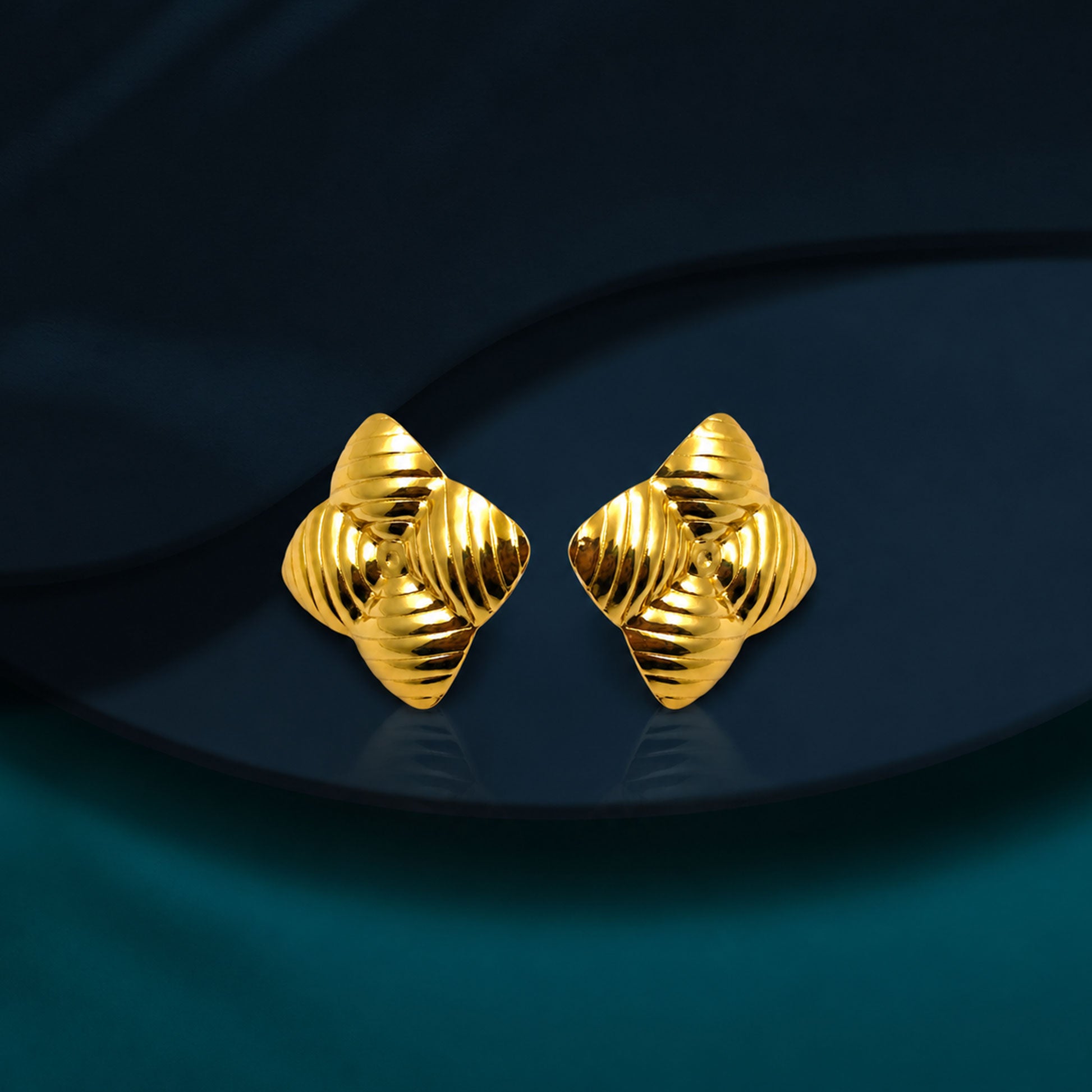 Gold star earrings styled as modern fashion jewellery for women