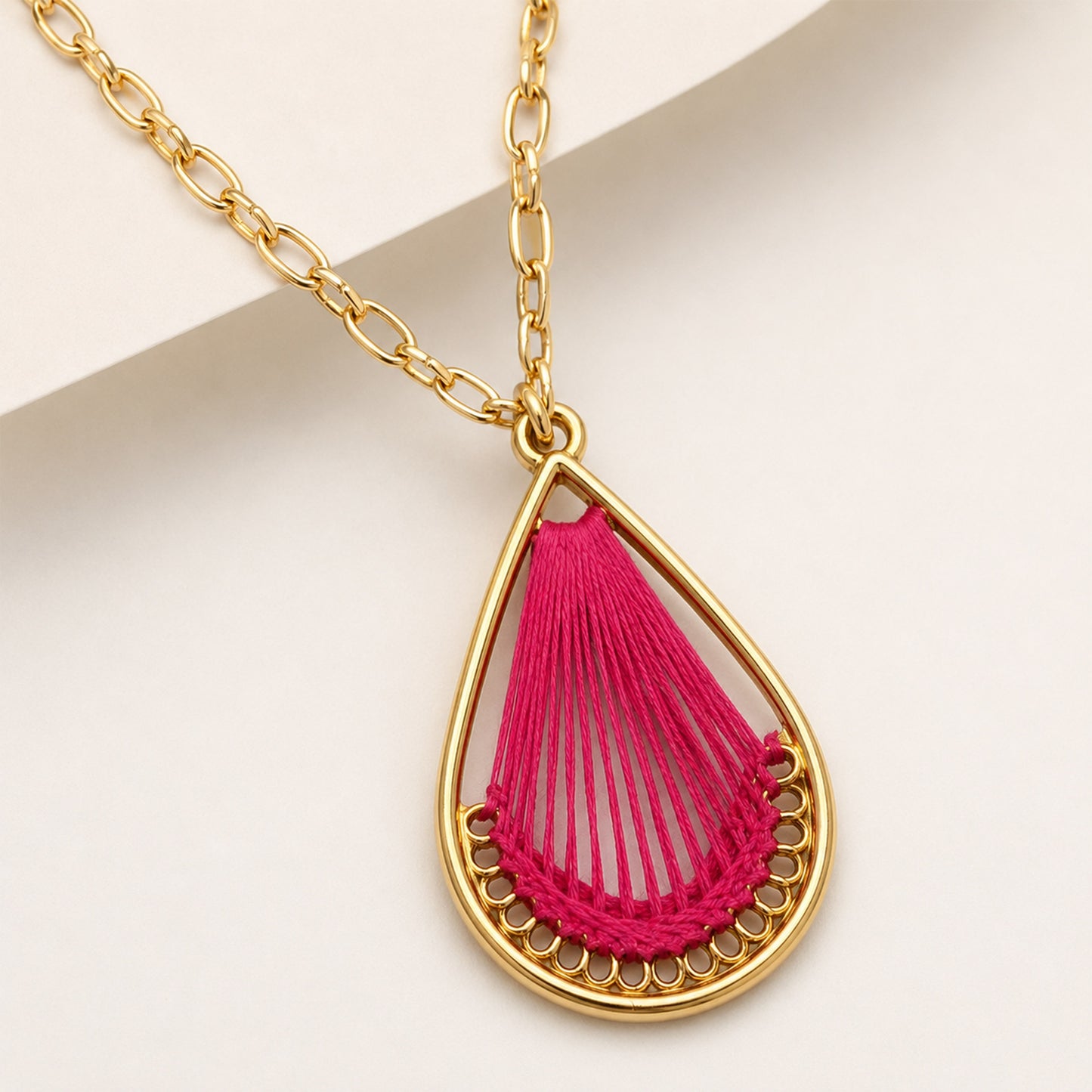 Gold pink necklace styled as colourful fashion jewellery for women