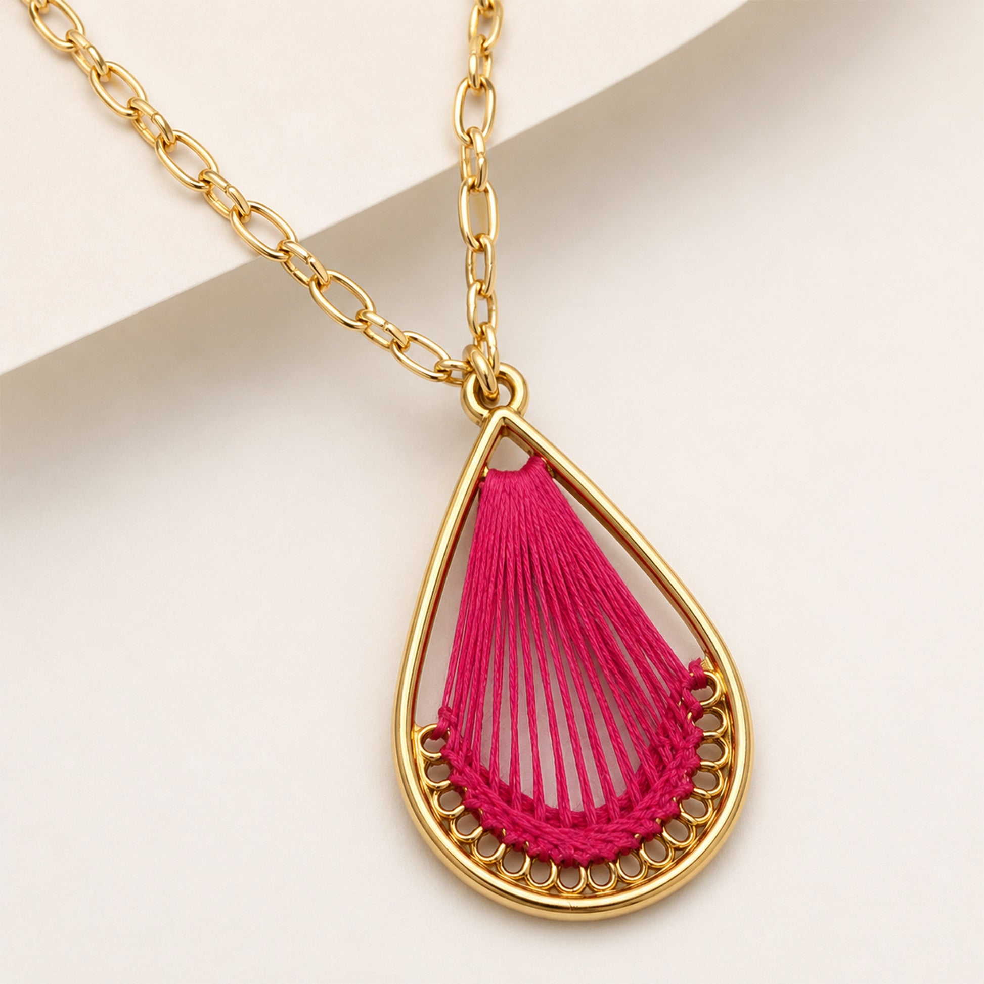 Gold pink necklace styled as colourful fashion jewellery for women