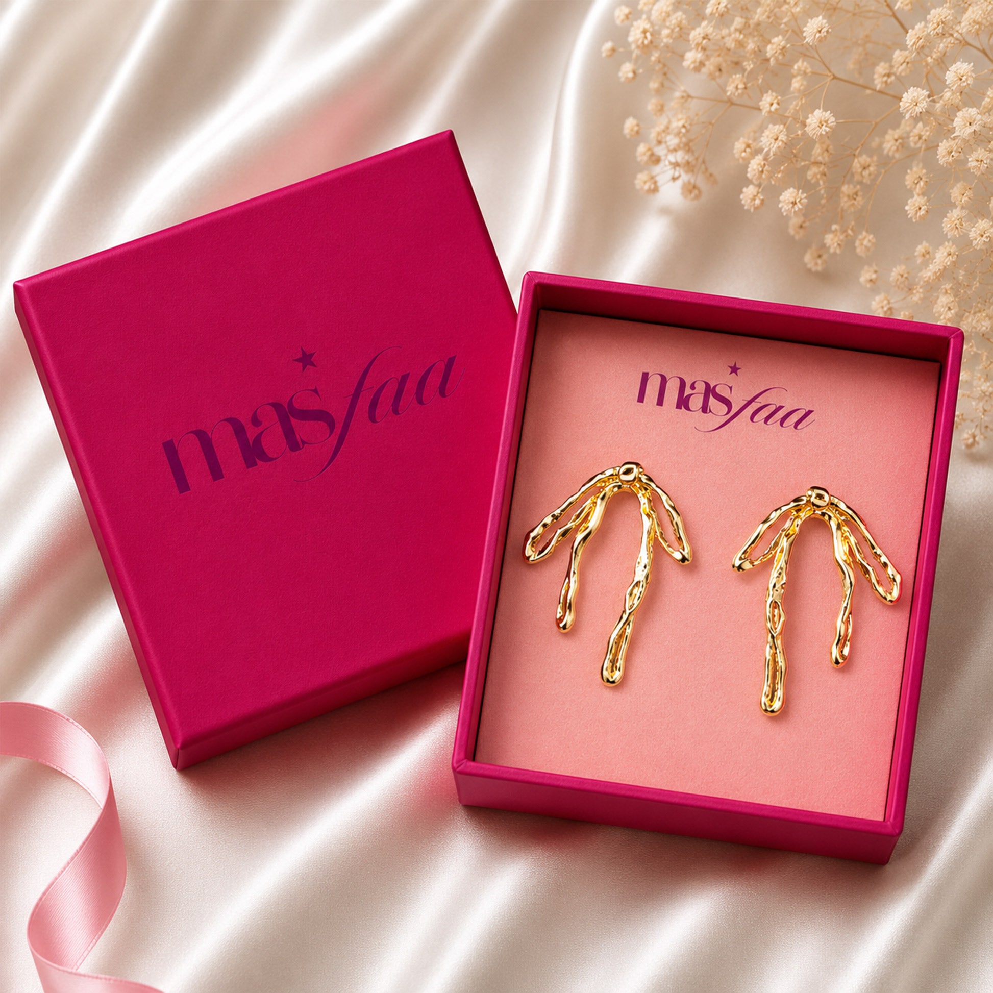Gold branch earrings styled as modern fashion jewellery for women