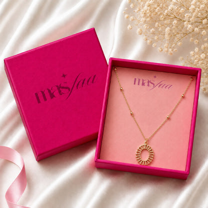 Gold geometric necklace styled as modern fashion jewellery