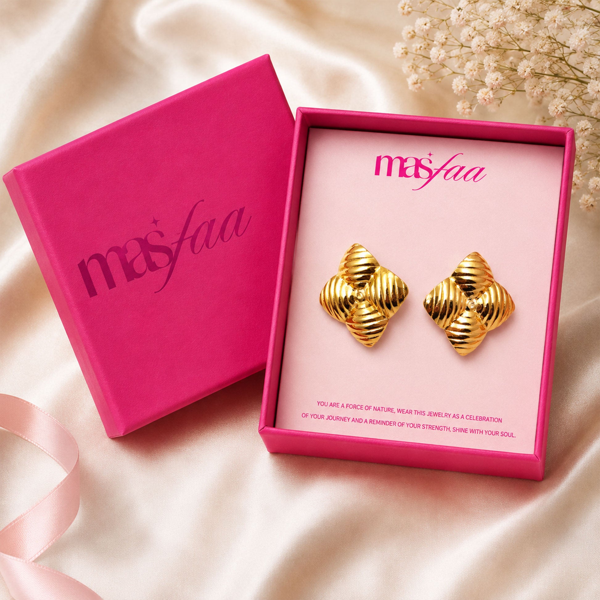 Detailed view of bold gold star stud earrings