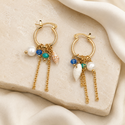 Gold plated hoop earrings with blue beads and chain tassels