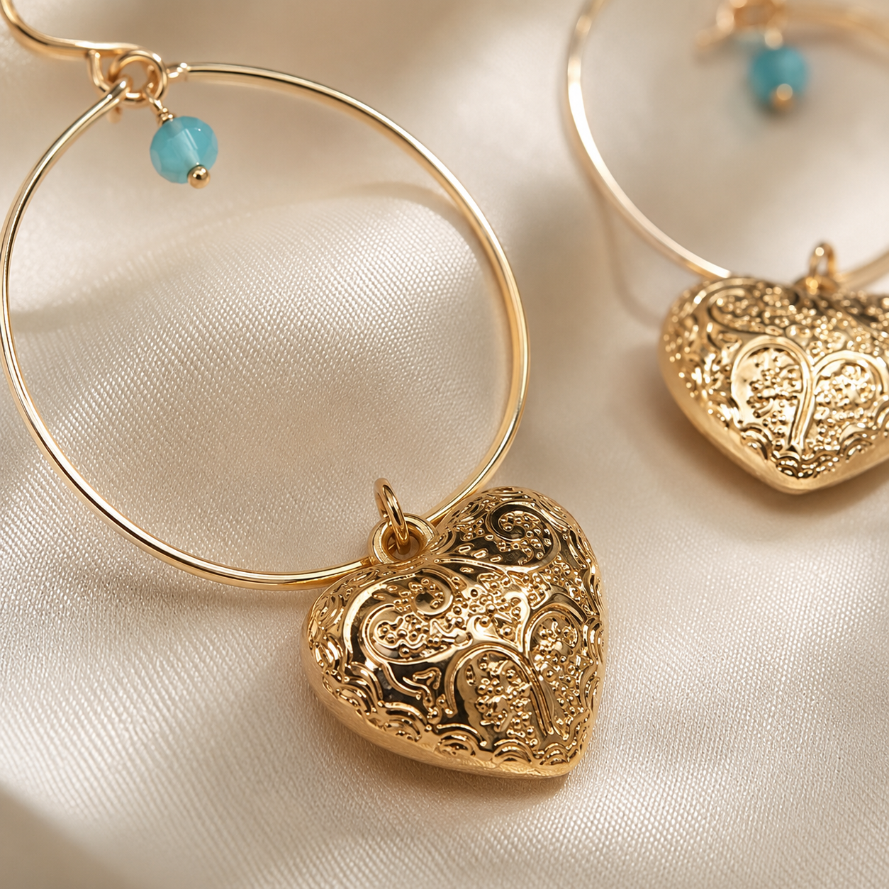 Gold plated hoop earrings with turquoise bead accent