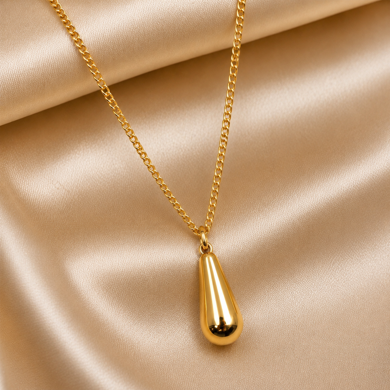 Gold plated pendant necklace with elongated drop design