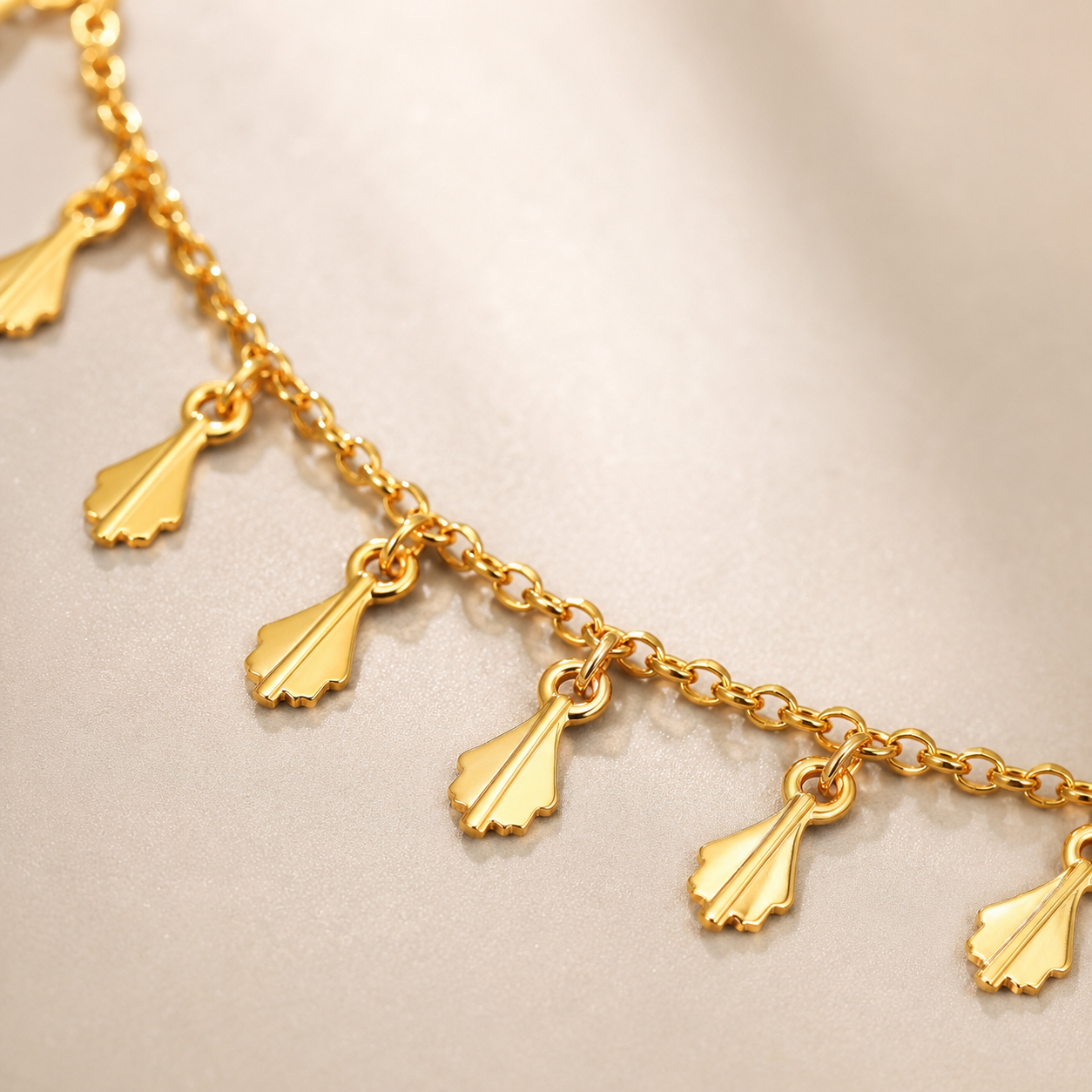 Gold plated fine chain necklace with delicate fringe design