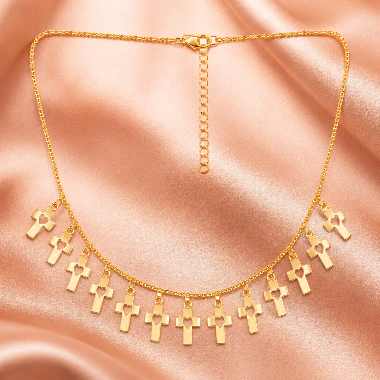 Gold plated chain necklace with multiple hanging cross pendants