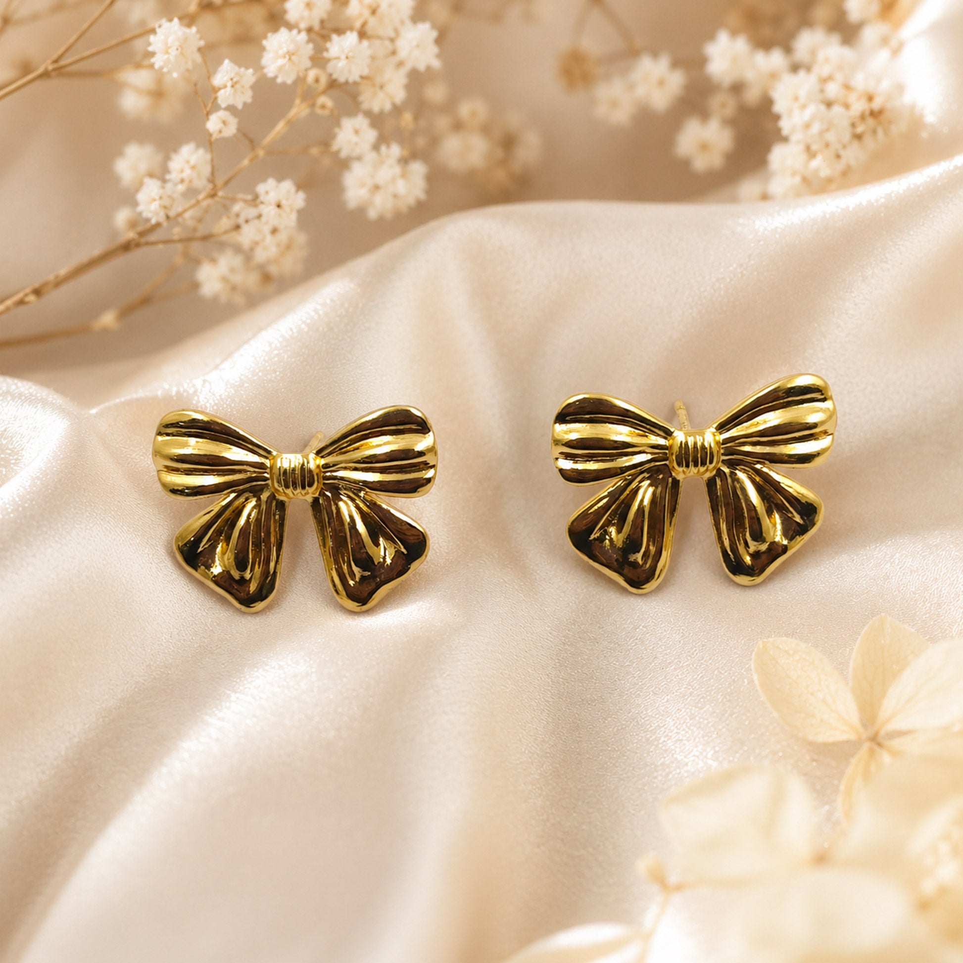 Stylish gold bow earrings for women daily wear and party look