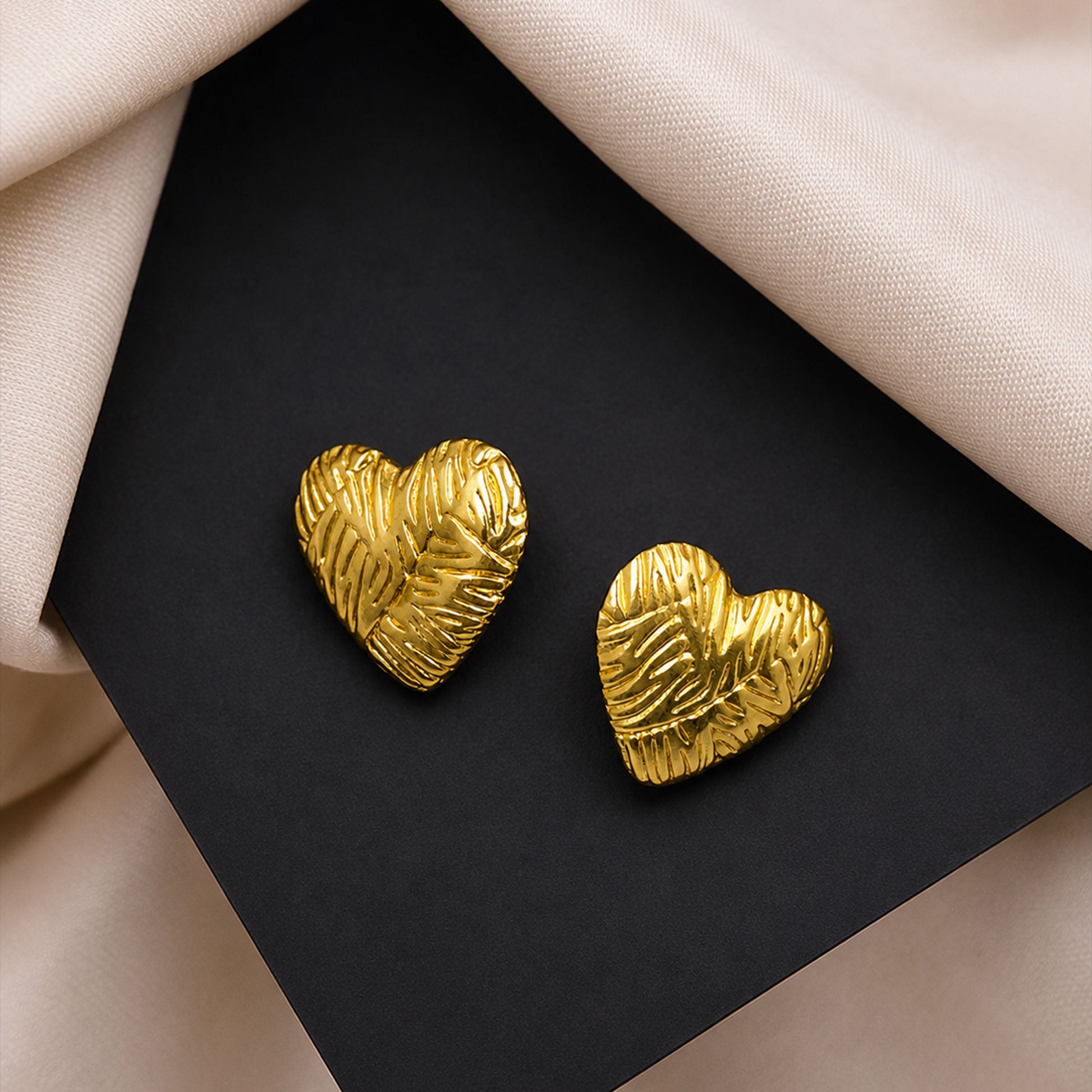 Lightweight gold plated heart stud earrings for gifting and casual wear