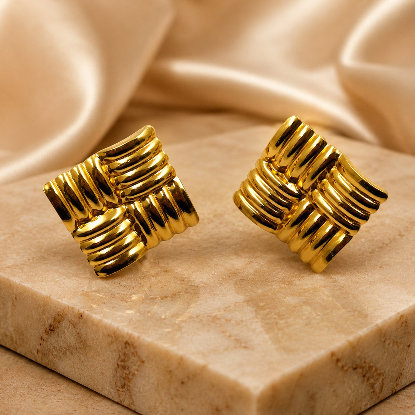 Gold knot earrings styled as modern fashion jewellery for women