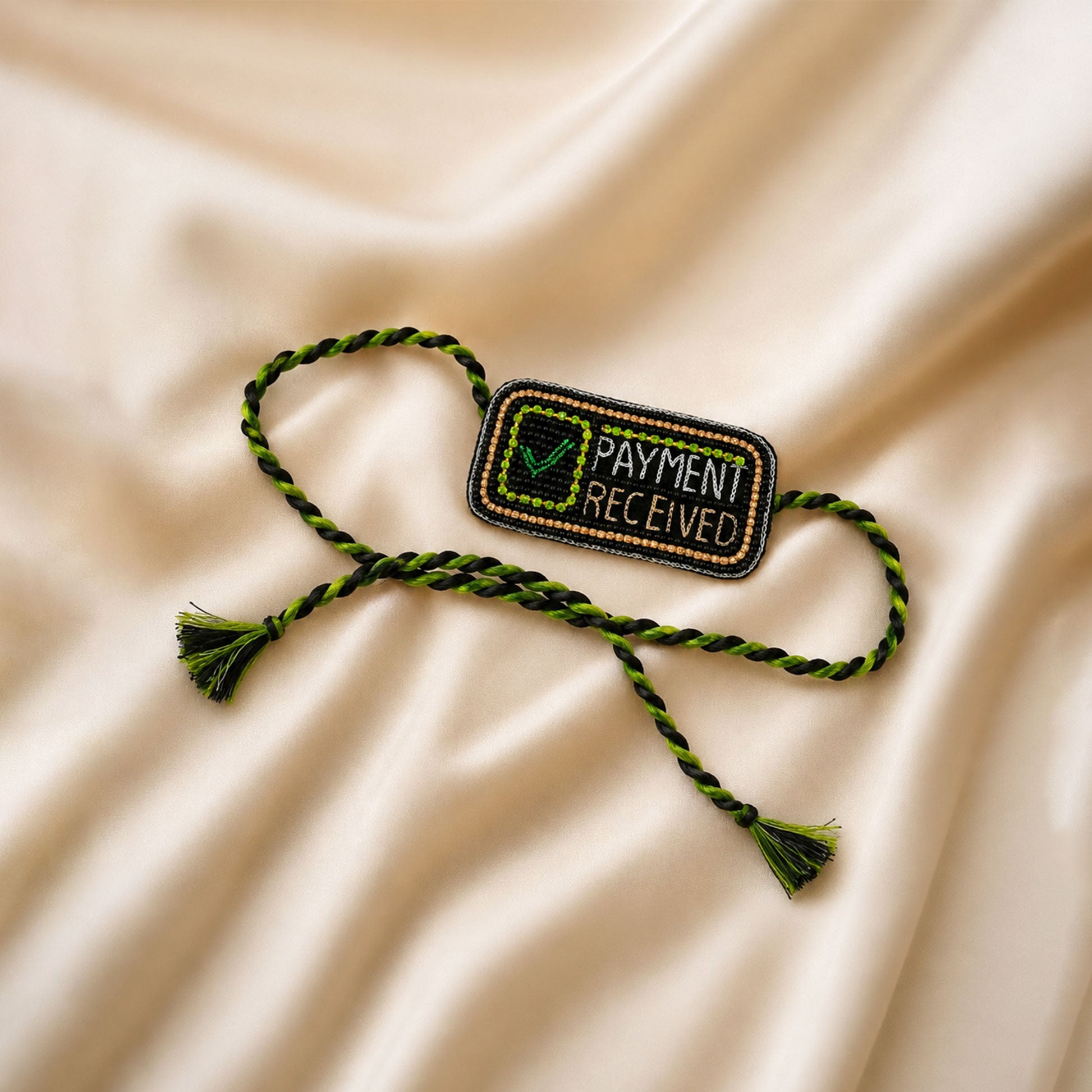 Trendy payment received rakhi with golden border design