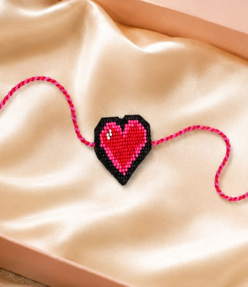Lightweight pink heart rakhi for brother festive gifting