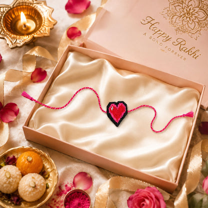 Detailed view of handcrafted pink and black beaded rakhi