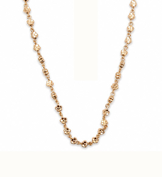 Rose gold floral link chain necklace on white background
