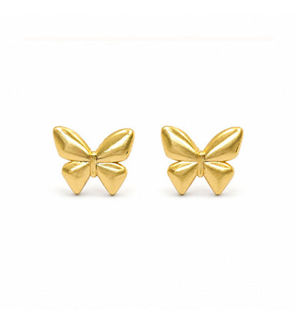 Gold butterfly stud earrings pair on white background